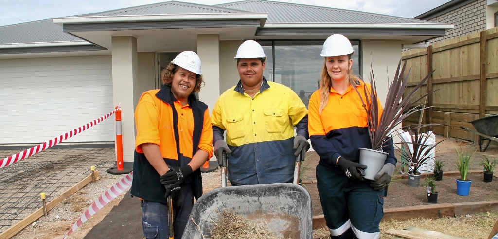 ON THE JOB: Luke Craig, Jarrod Pickering and Madeline Peace have helped to build a house at Yarrabilba as part of a BoysTown initiative to lower youth unemployment. ON THE JOB: Luke Craig, Jarrod Pickering and Madeline Peace have helped to build a house at Yarrabilba as part of a BoysTown initiative to lower youth unemployment.